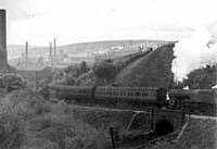 1IHA Hughes LMS 4-6-4 tank starting the climb out of Bacup with a two coach train in the 1930s.  Whitworth Historical Society.